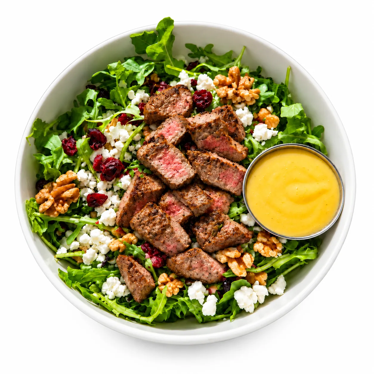 Arugula steak salad with goat cheese, cranberries and walnuts at Redondos Miami on Bird Road