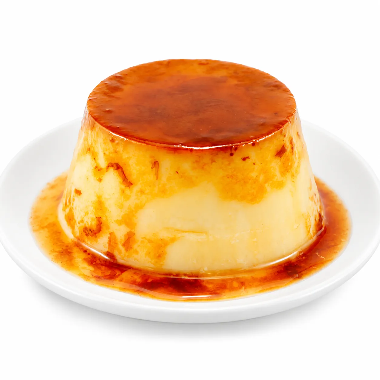 Creamy flan con caramelo with caramel sauce at Redondos Miami on Bird Road