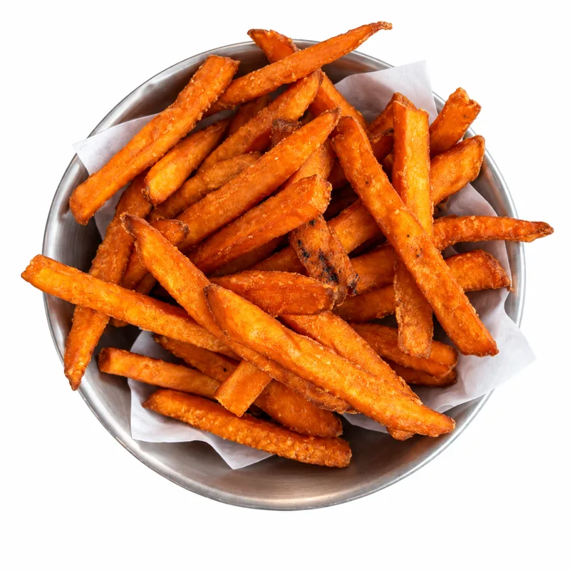 Bowl of crispy golden sweet potato fries at Redondos Miami