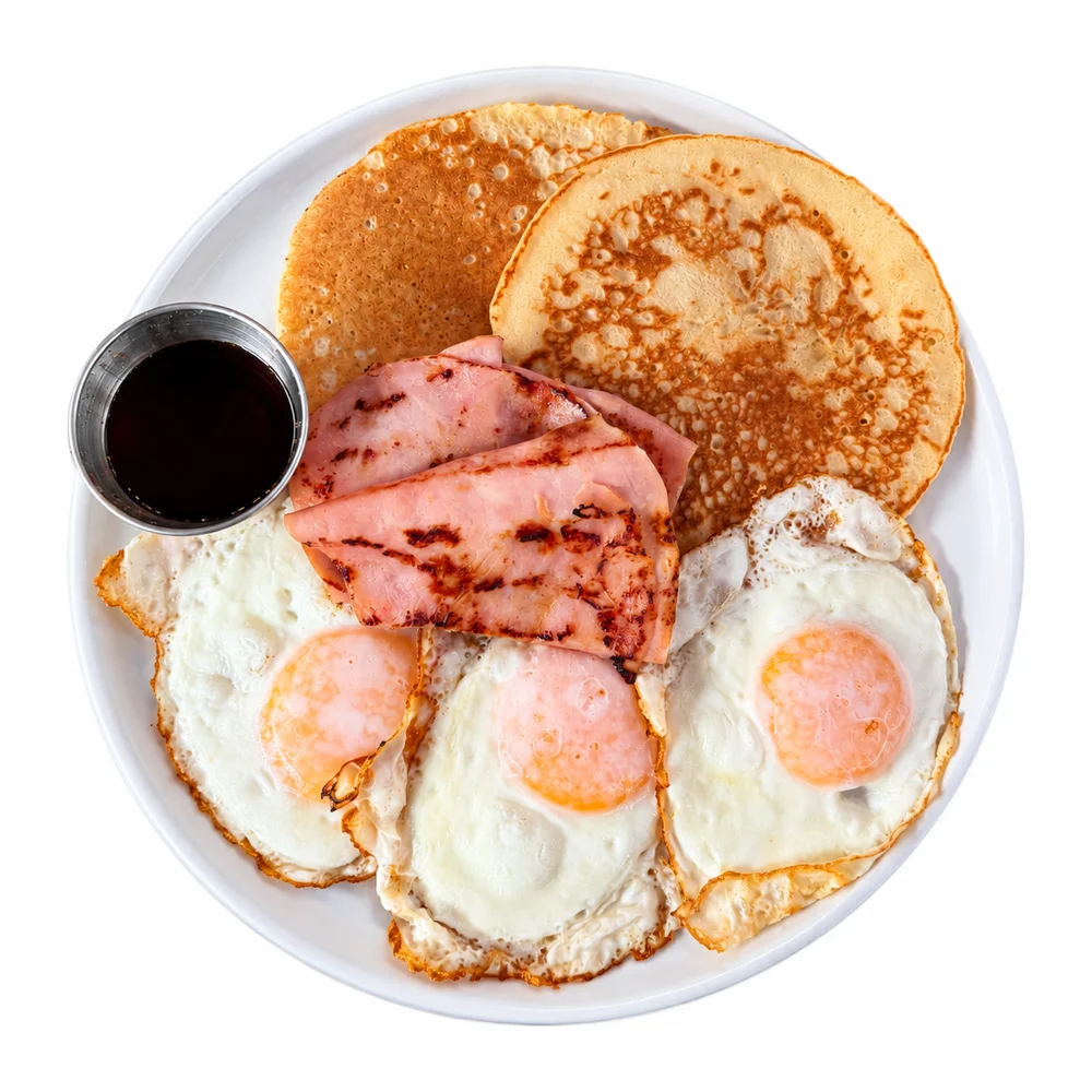Classic breakfast with three eggs, honey ham and pancakes at Redondos Miami on Bird Road
