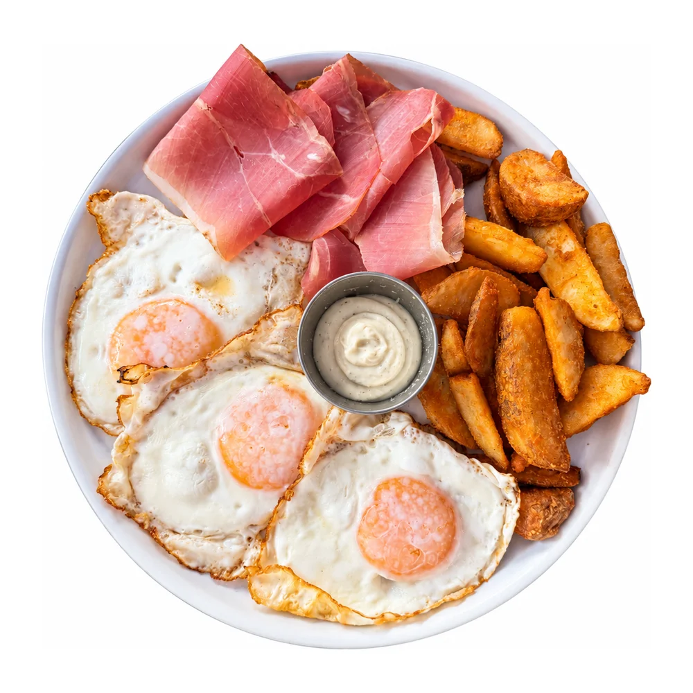 Prosciutto breakfast with three eggs, potato wedges and toast at Redondos Miami on Bird Road